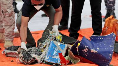 Indonesia locates black boxes of crashed jet as bodies recovered