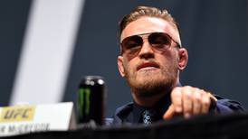 Conor McGregor lays cards on table in poker game with UFC