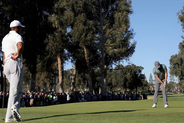 Graeme McDowell leads at Riviera as Woods misses the cut