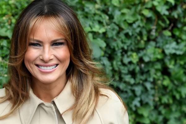 Melania Trump braves stormy weather in to-die-for trench coat