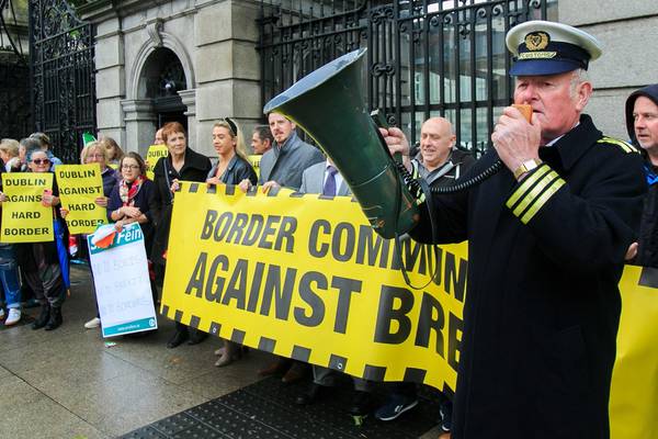 Boris Johnson visit: Small protest takes place outside Leinster House