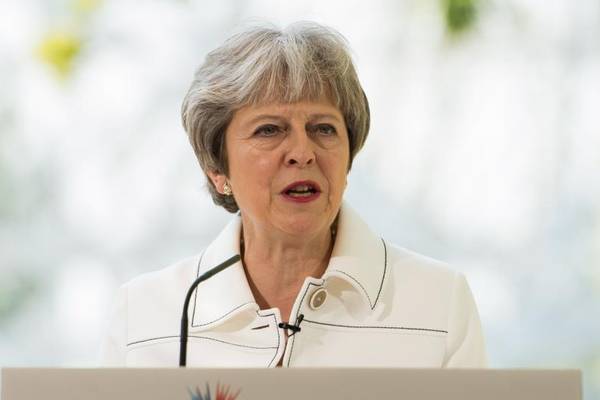 Westminster committee urges May to take more active role in North