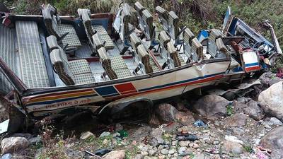 Overloaded bus plunges into gorge in India, killing dozens