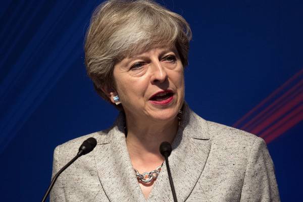 May pushes Northern Ireland leaders to restore government