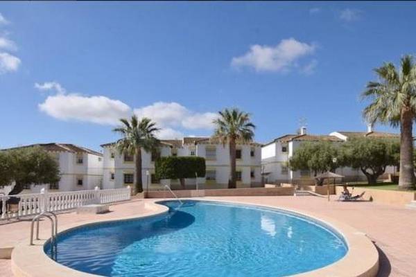 Two-bed apartment in Longford, or one-bed with pool in Spain?