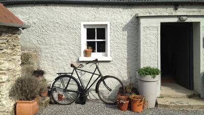 Brass bed, range, dog: get the Irish country cottage look