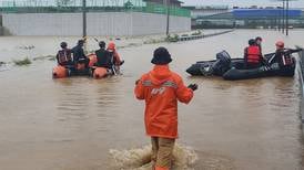 South Korea rescuers retrieve eight bodies from flooded underpass