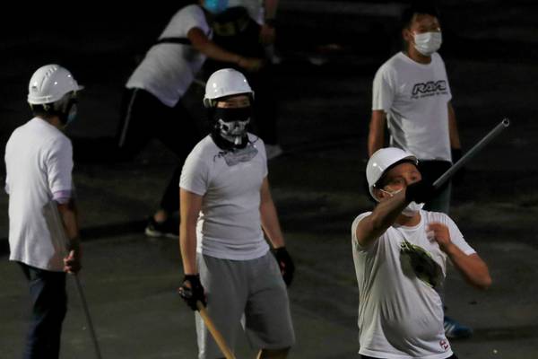 Hong Kong police under fire after ‘triads’ beat protesters