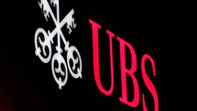 UBS sticks to dividend, capital return plans after French verdict