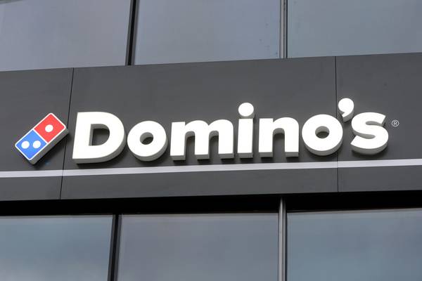 Domino’s sees profit at lower end of range, shares down