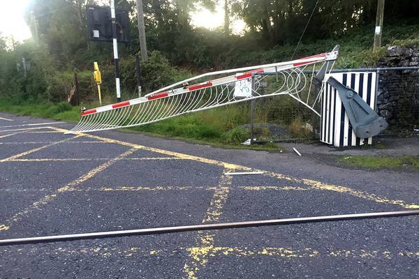 Van smashes through level crossing as train approaches in Galway