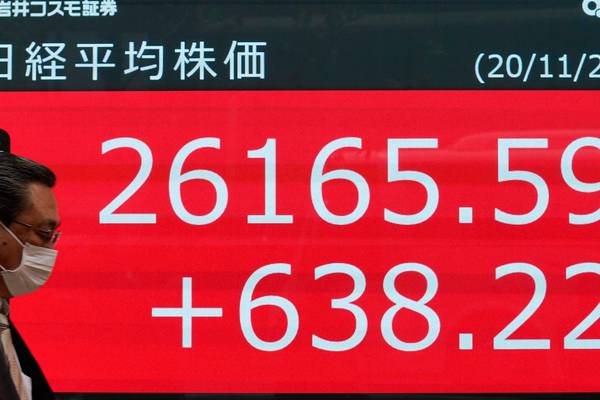 Asian shares ease from record high; oil falls on virus case surge