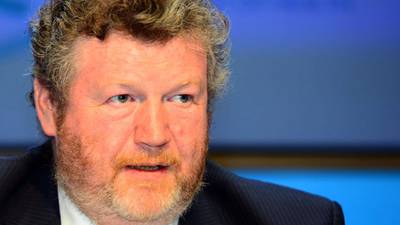 Reilly warns private health insurers to cut costs