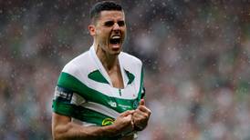 Tom Rogic’s injury-time strike seals treble for Celtic