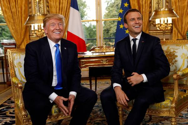 Trump finds glamour, glitz and military regalia in Macron’s Paris