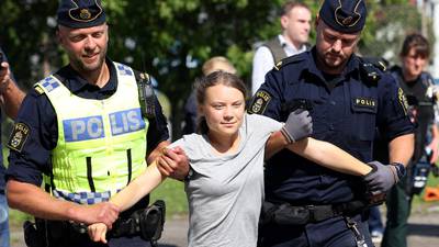 Greta Thunberg removed by police from protest hours after receiving court fine