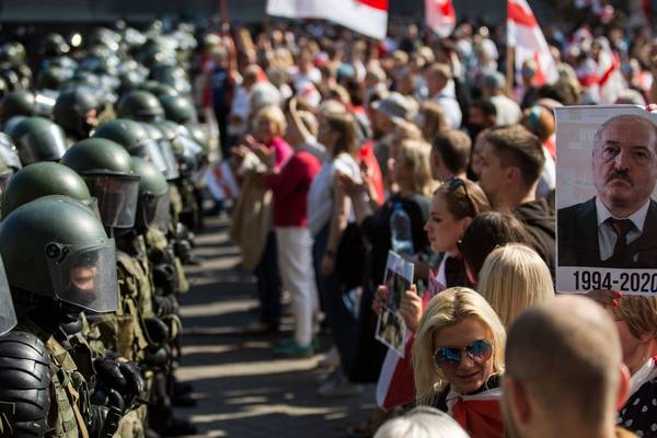 Protesters crowd Minsk as Belarus leader gets birthday call from Putin