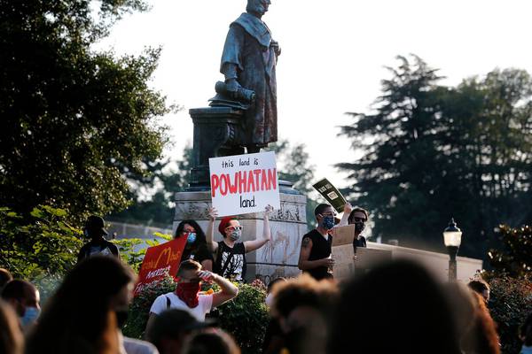 Christopher Columbus statue torn down and thrown in lake by anti-racism protesters