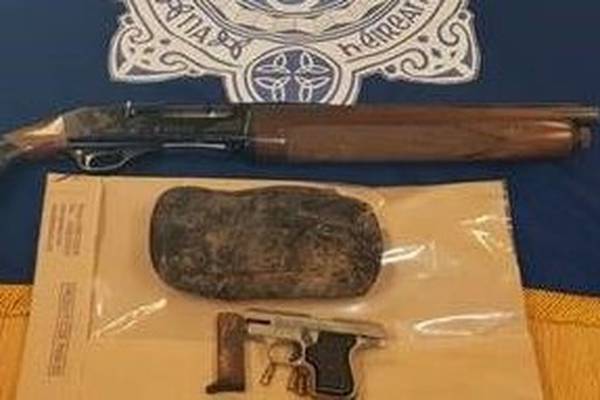 Sawn-off shotgun and pistol found in parked car in Dublin