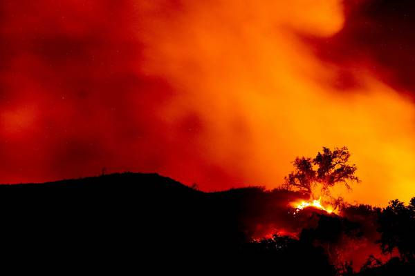 More than 1,000 firefighters battle wildfire spreading along California coast