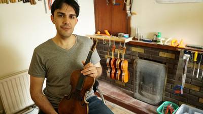 Violin-making refugee shapes a sweeter sounding future