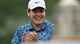 Different Strokes: McIntyre announces his return to golf by handing out Scottish chocolate bars