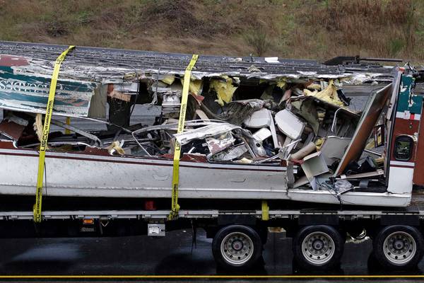 US train crash investigators look at whether driver was distracted