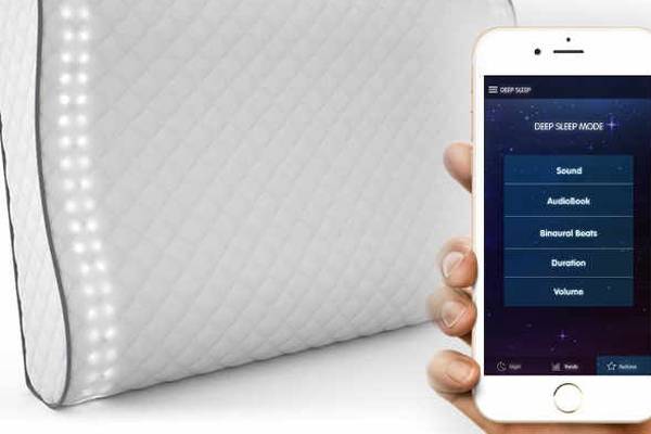Pillow that tracks your sleep, wakes you up and plays music