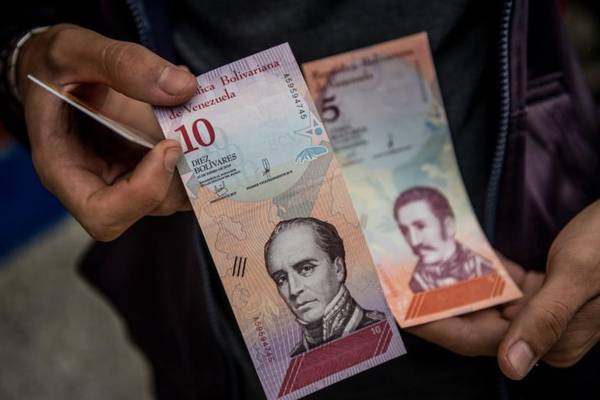 Venezuela’s currency devaluation spreads confusion and closes shops