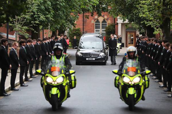 ‘He was in everyone’s hearts’: Thousands line Belfast streets in farewell to Noah Donohoe