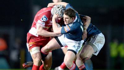 Scarlets deny Munster in physical battle
