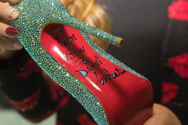 Can Christian Louboutin trademark red soles?