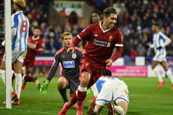 Liverpool get back to winning ways as Huddersfield slide