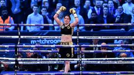 Katie Taylor claims first pro title with crushing display