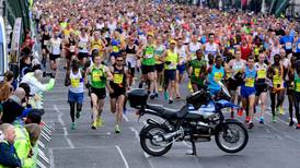 Almost 20,000 tackle Dublin marathon and avoid a motorbike