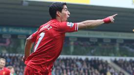 Luis Suarez suggests he will stay at Liverpool