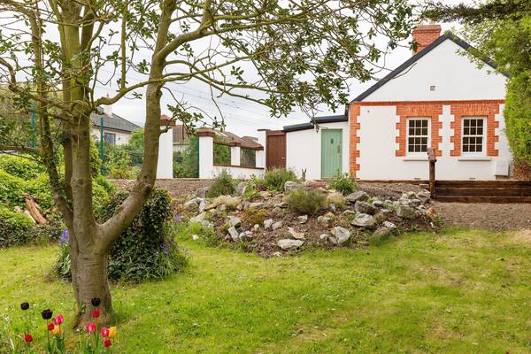 Enchanting cottage with rolling gardens in Sutton for €495k