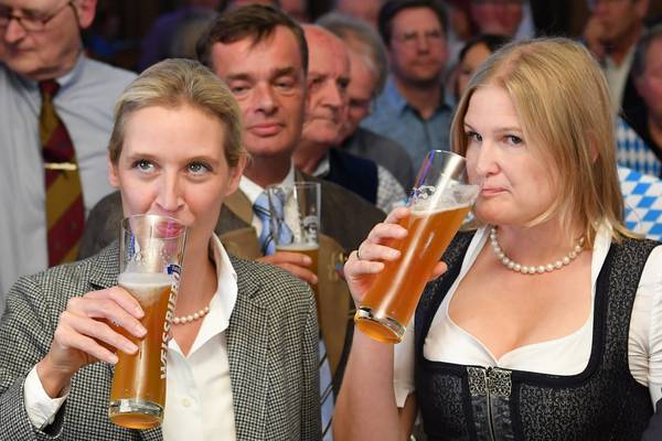 Merkel’s conservative allies humbled in Bavarian state poll