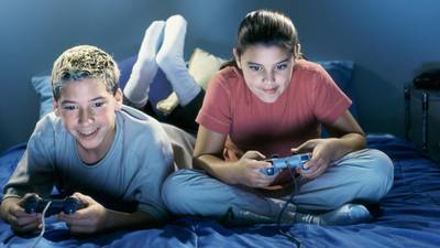 Playing video games can boost exam performance, OECD  claims