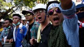 Thai government tells protest leader to quit and face charges