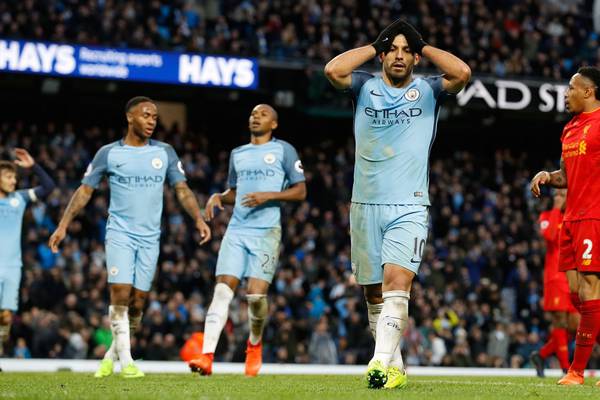 Man City and Liverpool share spoils  after breathless encounter