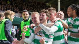 Celtic all but secure title with Hearts win