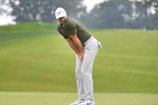 Rory McIlroy stalls but remains in contention at Aronimink