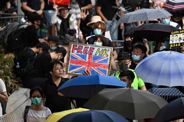 ‘I feel this is our duty’: Hong Kong protesters defy police ban to march