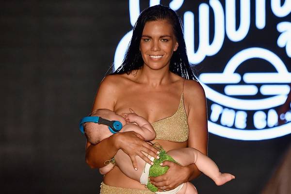 Model breastfeeds daughter on Sports Illustrated swimsuit runway