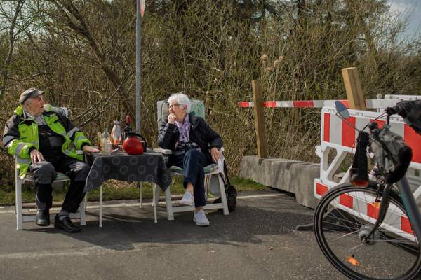 Love in the time of Covid-19: A closed border can’t stop this elderly couple