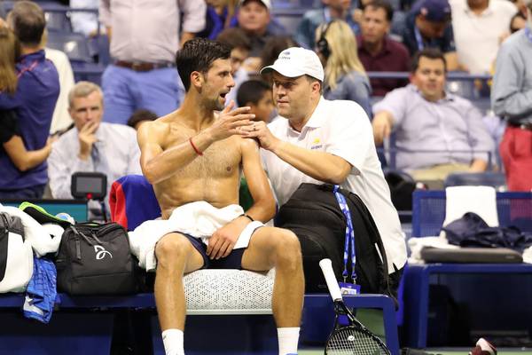 US Open: Djokovic plays through shoulder injury to advance