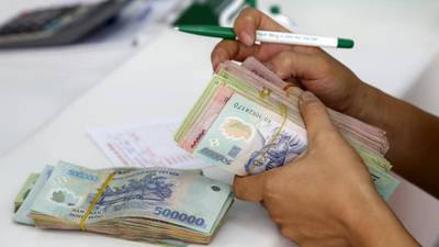 Currency falls raise solvency concerns in emerging markets