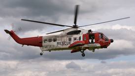 Firm awarded search-and-rescue contract says it will follow staff retention rules 