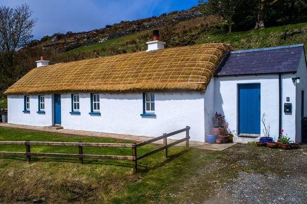 Donegal thatched cottage by the sea with income potential for €275k